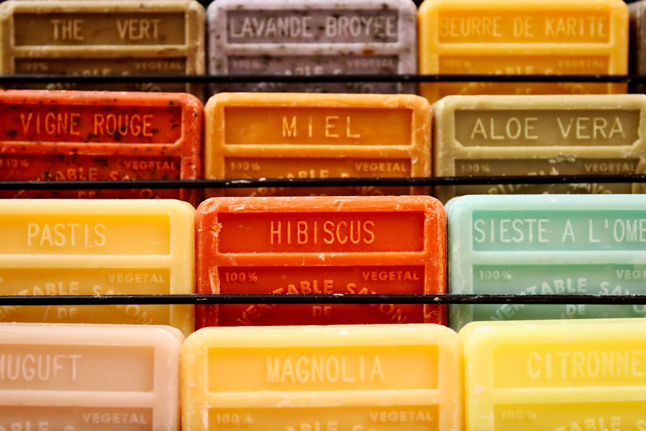 Colorful display of handmade aromatherapy soaps in various scents.